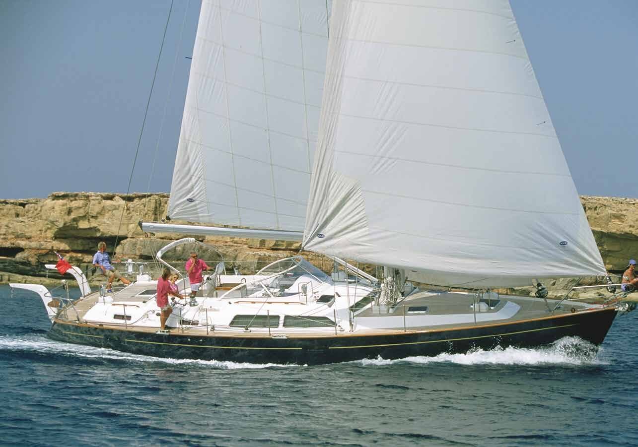 Cruising yacht under full sail